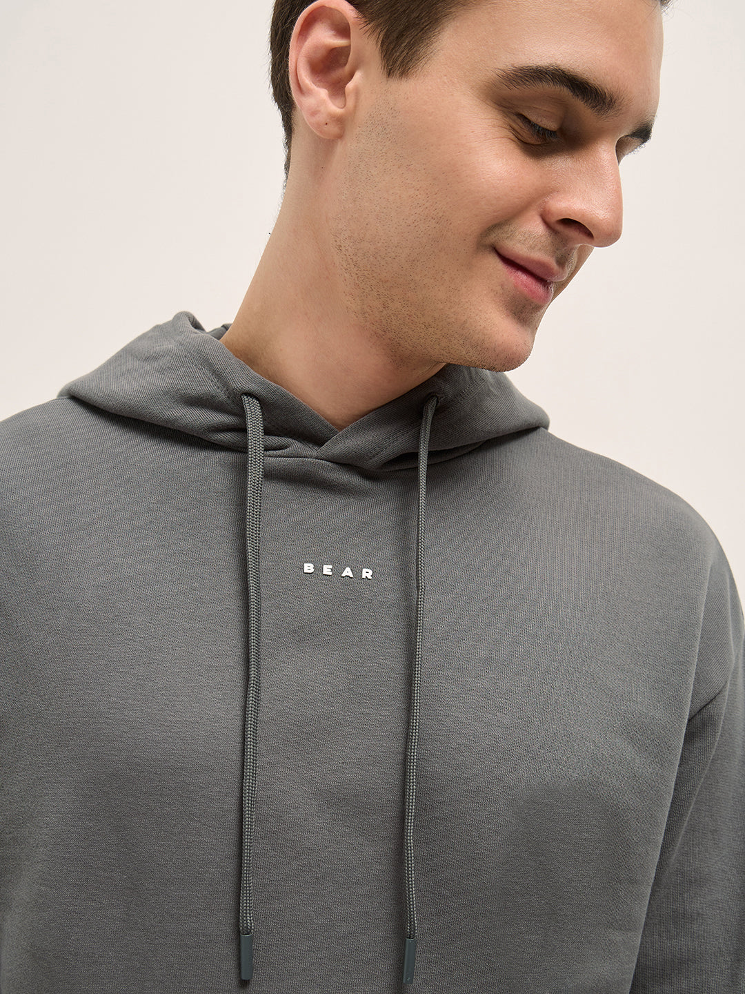Grey Solid Relax Fit Hoodie by The Bear House